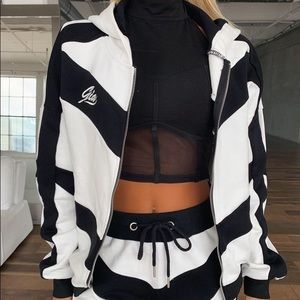 I.AM.GIA black and white colorblock zip up sweater